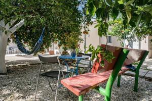 A garden outside Olga's Organic garden Home for a couple! with Wifi & AC