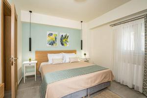 A bed or beds in a room at Olga's Organic garden Home for a couple! with Wifi & AC