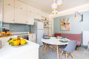 A kitchen or kitchenette at Olga's Organic garden Home for a couple! with Wifi & AC