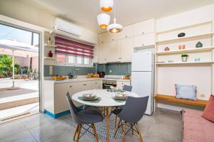 A kitchen or kitchenette at Olga's Organic garden Home for a couple! with Wifi & AC