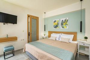 A bed or beds in a room at Olga's Organic garden Home for a couple! with Wifi & AC