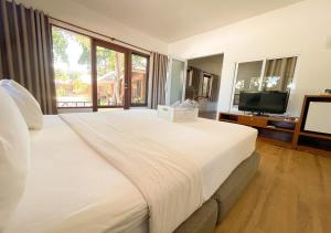 Postel nebo postele na pokoji v ubytování Samed Cabana Resort + 36 fotografií