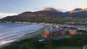 an aerial view of a resort and the beach at Mournes Hot Tub Retreat, 4-Star Accommodation in Newcastle