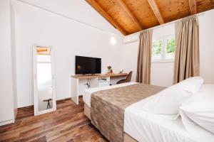 Postel nebo postele na pokoji v ubytování Villa Diana