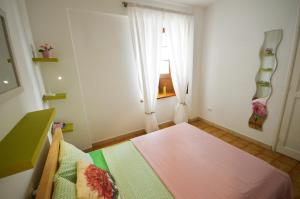 Postel nebo postele na pokoji v ubytování Primavera