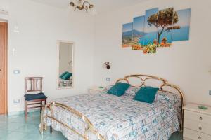מיטה או מיטות בחדר ב-Lo Sguardo sull' Infinito