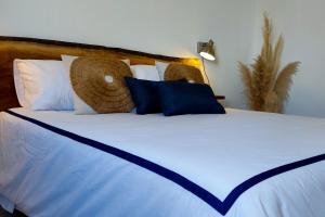 Postel nebo postele na pokoji v ubytování Eirinhas Bela Vista RAAL 2909