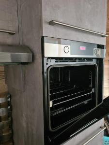 Kuchyň nebo kuchyňský kout v ubytování Gîte le petit bûcheron