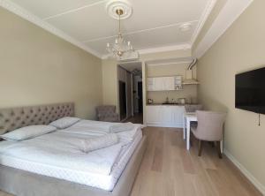 Кровать или кровати в номере Raudteevalitsuse Villa