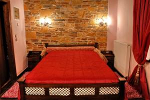 A bed or beds in a room at Luxury Guesthouse Pantheon
