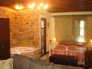 A bed or beds in a room at Luxury Guesthouse Pantheon