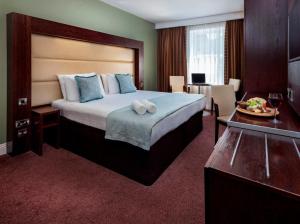 Voodi või voodid majutusasutuse Treacy's Hotel Wexford toas