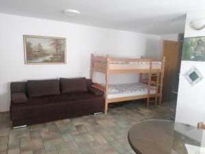 Postel nebo postele na pokoji v ubytování Apartma Gače