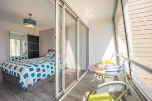 Cama ou camas em um quarto em Les Vagues