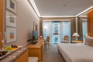 Posteľ alebo postele v izbe v ubytovaní Melia Athens