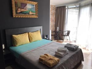 Postel nebo postele na pokoji v ubytování Batumi West Hotel