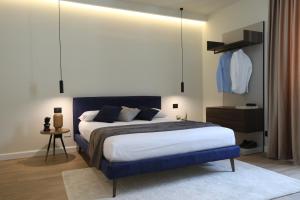 Postel nebo postele na pokoji v ubytování SCIABICA SUITE - Sicilian Experience