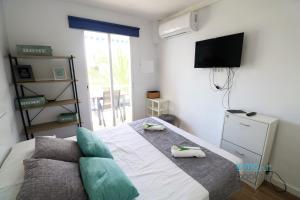 Postel nebo postele na pokoji v ubytování Sun Beach Bellavista con vistas al mar