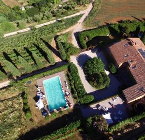 an overhead view of a house with a swimming pool at Villa Avesa in Verona