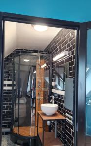 Ванна кімната в Chambre d'hote Le clos Valmont