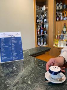 Příslušenství pro přípravu čaje a kávy v ubytování Vittoria Parc Hotel