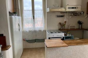 Kuchyňa alebo kuchynka v ubytovaní Appartamento nelle Terre del Tufo