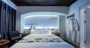 Postel nebo postele na pokoji v ubytování Suzhou Houlishenghuo Guesthouse