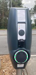 a parking meter on the side of a road at Hotel ARBOR - Les Hunaudieres - Le Mans Sud - Mulsanne in Mulsanne