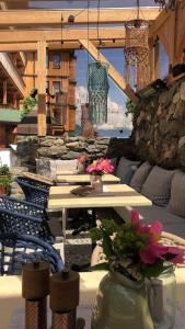 Posedenie v ubytovaní Appartement Zillertal Klee mit Restaurant KleemenTine