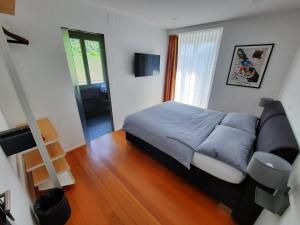 TV a/nebo společenská místnost v ubytování B&B Cà Nosa