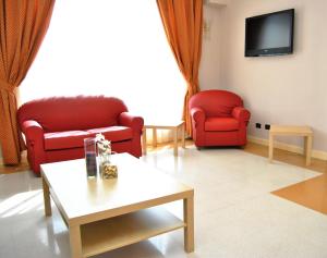 A seating area at Hotel Sextum