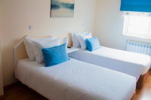 Katil atau katil-katil dalam bilik di Pedrógão Guesthouse