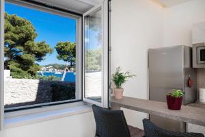 Kuchyňa alebo kuchynka v ubytovaní Beach Residences Caroline