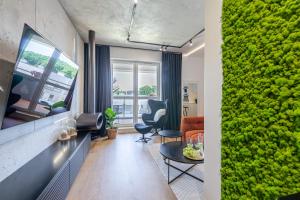Posedenie v ubytovaní Apartament Sady # 110