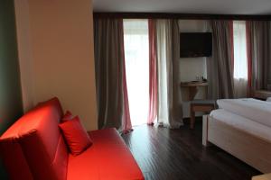 Postelja oz. postelje v sobi nastanitve Das Posch Hotel