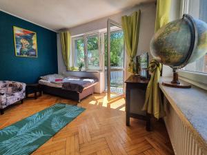Posteľ alebo postele v izbe v ubytovaní Hostel Mazurska 8a