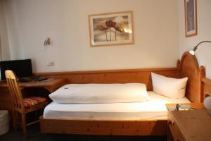 Postelja oz. postelje v sobi nastanitve Das Posch Hotel