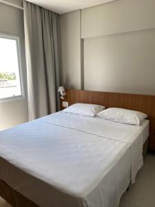 Cama ou camas em um quarto em Apartamento Salinas EXCLUSIVE RESORT