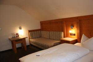 Postelja oz. postelje v sobi nastanitve Das Posch Hotel