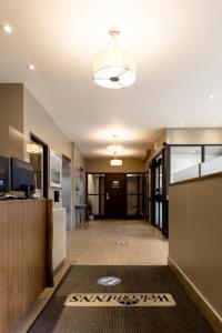 Lobbyn eller receptionsområdet på WelcomINNS Ottawa