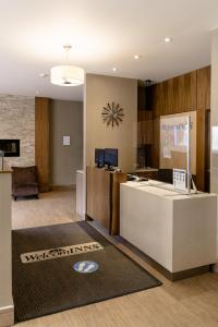 渥太華的住宿－渥太華威爾卡姆INNS酒店，大堂设有等候区,提供迎宾地毯