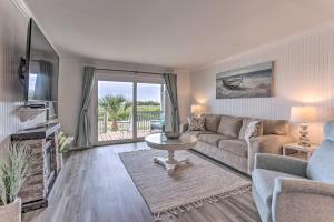 Beachfront Oasis Condo with Deck and Pool Access