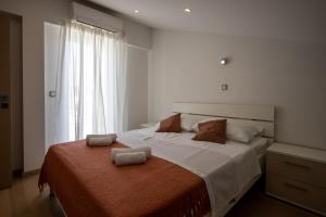 Posteľ alebo postele v izbe v ubytovaní Lumaja luxury apartman