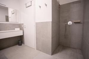 Koupelna v ubytování IseoLakeRental - Trivia Resort