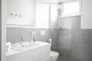 Koupelna v ubytování IseoLakeRental - Trivia Resort