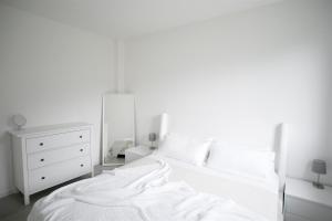 Postel nebo postele na pokoji v ubytování IseoLakeRental - Trivia Resort