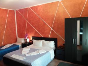 Postel nebo postele na pokoji v ubytování Cà Elsa B&B