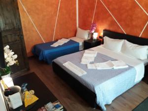 Postel nebo postele na pokoji v ubytování Cà Elsa B&B
