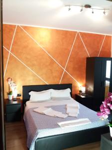 Postel nebo postele na pokoji v ubytování Cà Elsa B&B