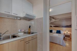 Posteľ alebo postele v izbe v ubytovaní Apartments Vranjes